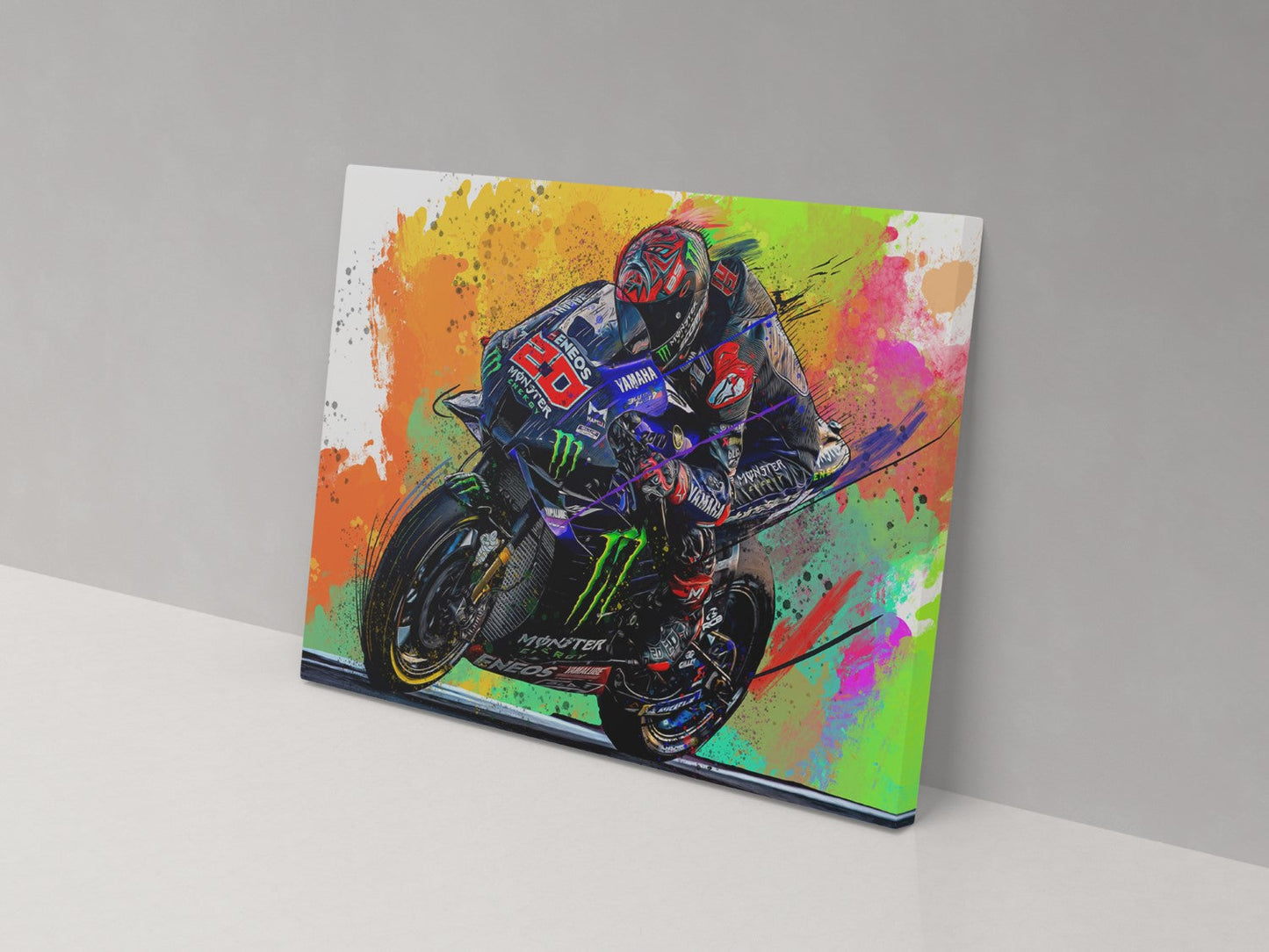 A canvas print featuring a colorful artistic depiction of a motorcycle racer in motion.