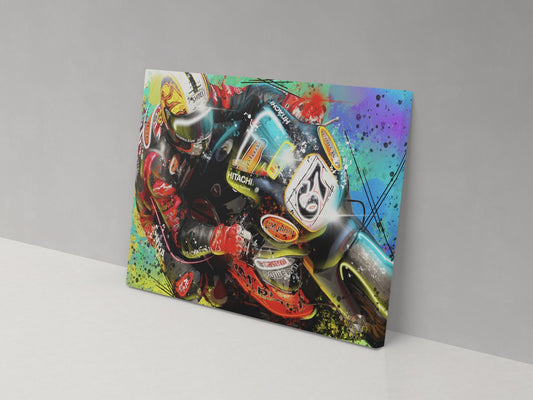 Shane Byrne riding the number 67 Be Wiser Ducati in colourful BSB canvas artwork.