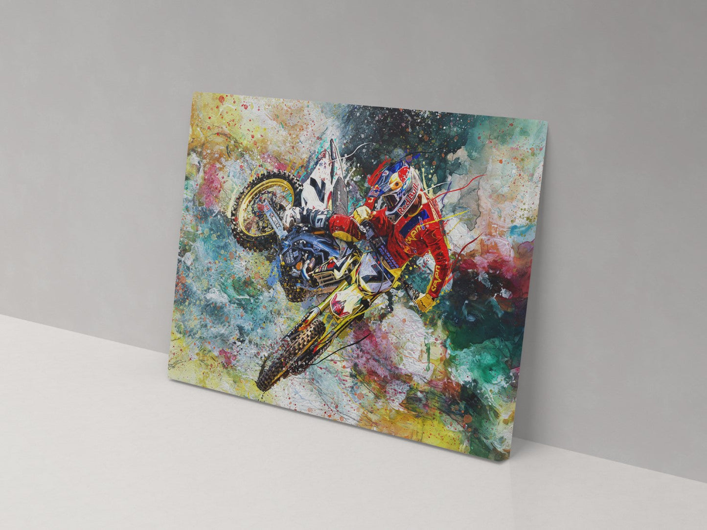 A canvas print featuring a colorful, abstract depiction of a motocross rider on a motorcycle.