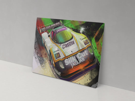 A canvas print featuring a colorful artistic representation of a Silk Cut Jaguar racing car.