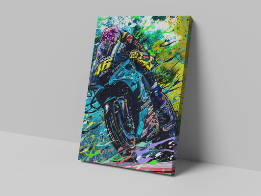 A canvas print featuring a colorful, abstract representation of a motorcycle with the number '46' on it, mounted on a wall.