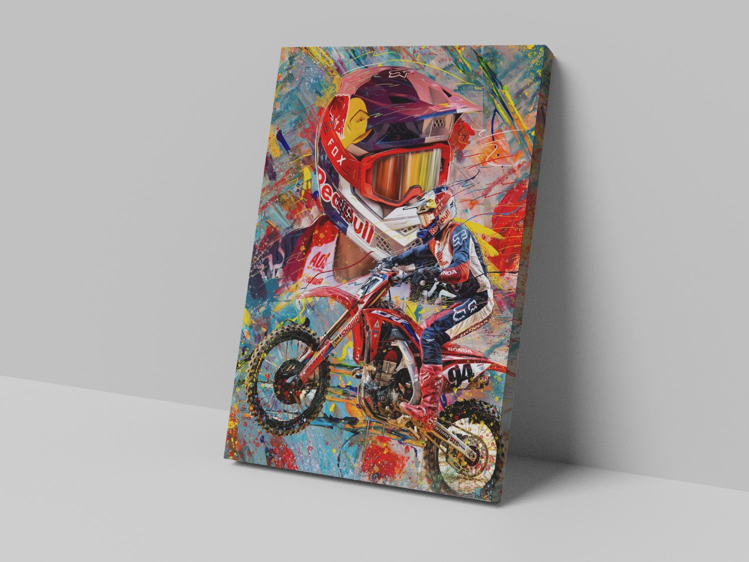 A canvas print featuring a colorful artistic depiction of a motocross rider with shiny goggles and a red bike.