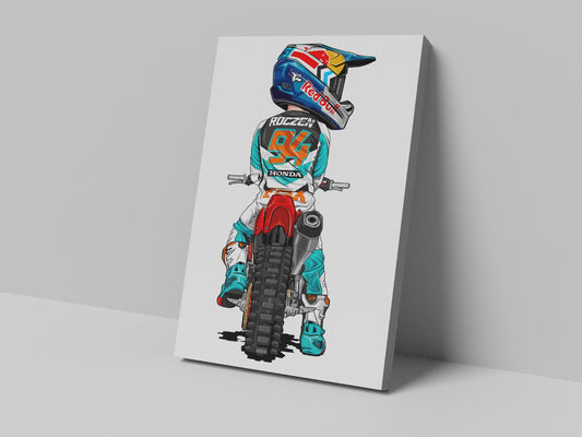 A canvas print featuring a colorful cartoon illustration of a motocross rider on a white background, mounted on a frame.