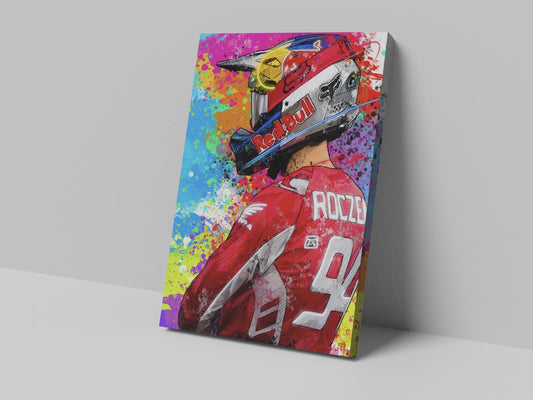 A canvas print featuring a colorful, abstract depiction of a motorcycle and rider in dynamic poses against a multicolored background.