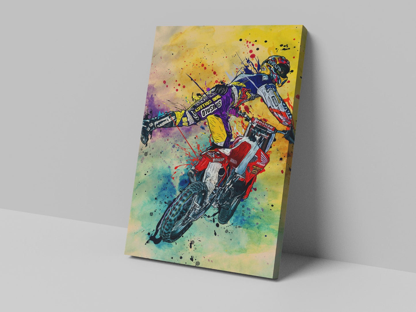 A canvas print featuring a colorful artistic depiction of a motocross rider in mid-action on a motorcycle.