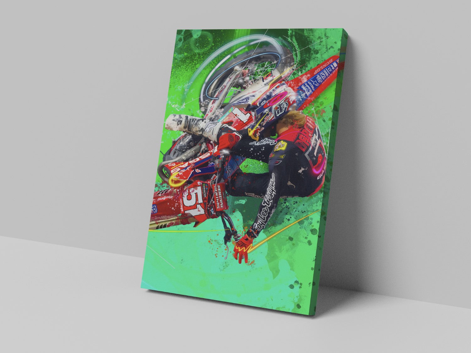 A canvas print featuring a colorful illustration of a motorcycle racer in a dynamic pose with sponsor logos, predominantly green with red and white accents.