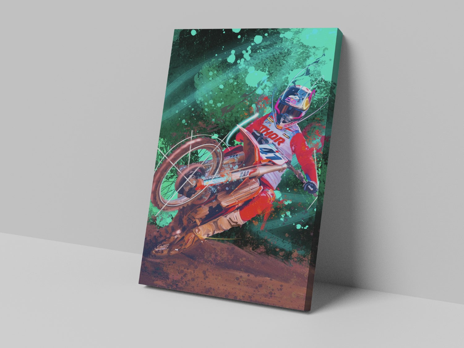 A canvas print featuring a colorful illustration of a motocross rider in mid-action on a dirt track.
