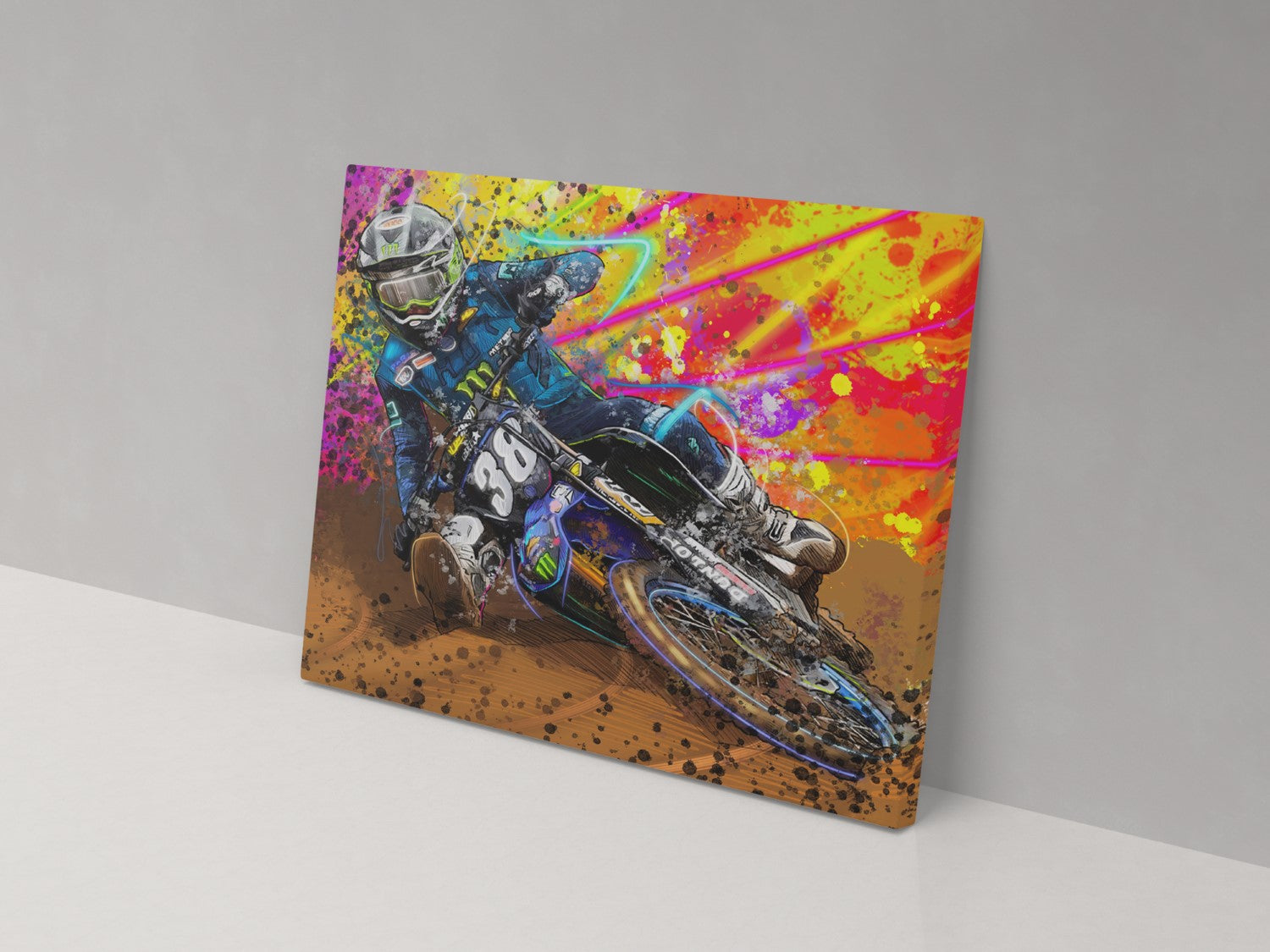 A canvas print featuring a colorful artistic representation of a motocross rider on a motorcycle with a dirt track background.