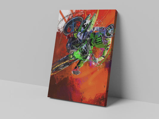 A canvas print featuring a colorful artistic representation of a motocross rider in mid-action, mounted on a wall.
