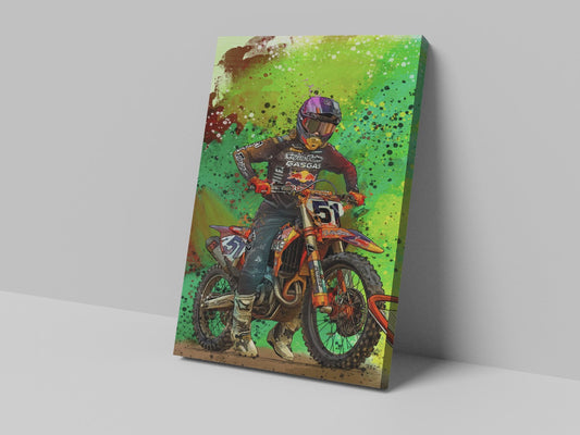 A canvas print featuring a colorful illustration of a motocross rider on a motorcycle with a green and orange background.