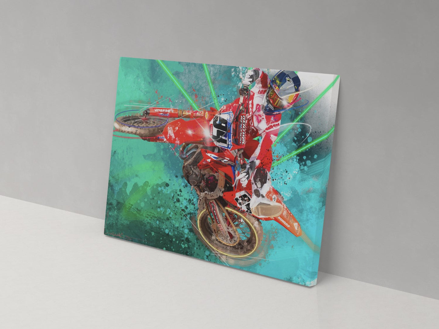 A canvas print featuring a colorful illustration of a motocross rider in mid-air, mounted on a wall.