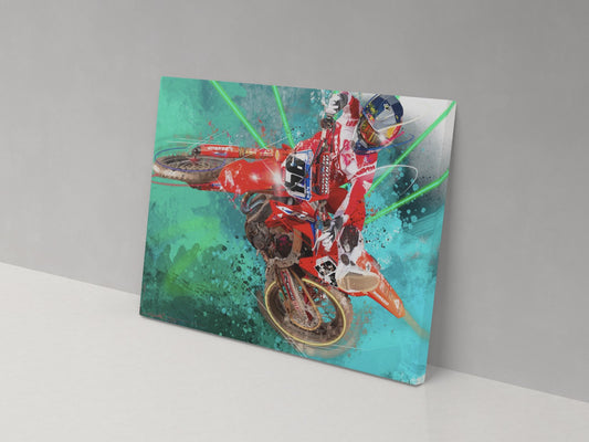 A canvas print featuring a colorful illustration of a motocross rider in mid-air, mounted on a wall.