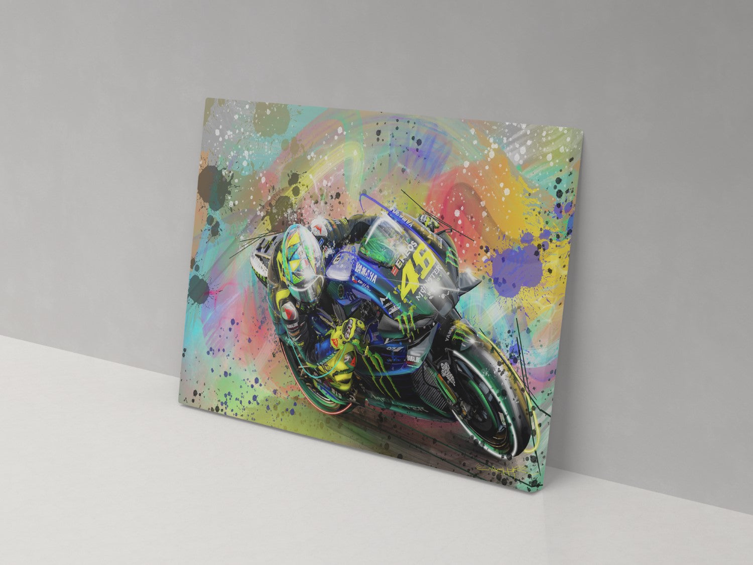 A canvas print featuring a colorful artistic depiction of a motorcycle racer in motion.