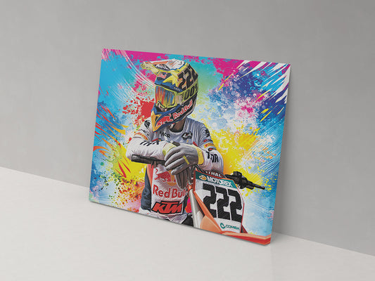 A canvas print featuring a colorful artistic representation of a motocross rider with a motorcycle, predominantly in racing gear and helmet.
