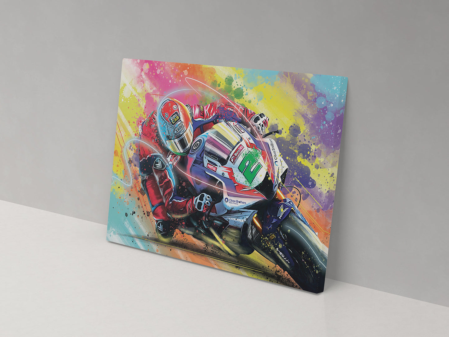 A canvas print featuring a colorful artistic depiction of a motorcycle racer in motion.