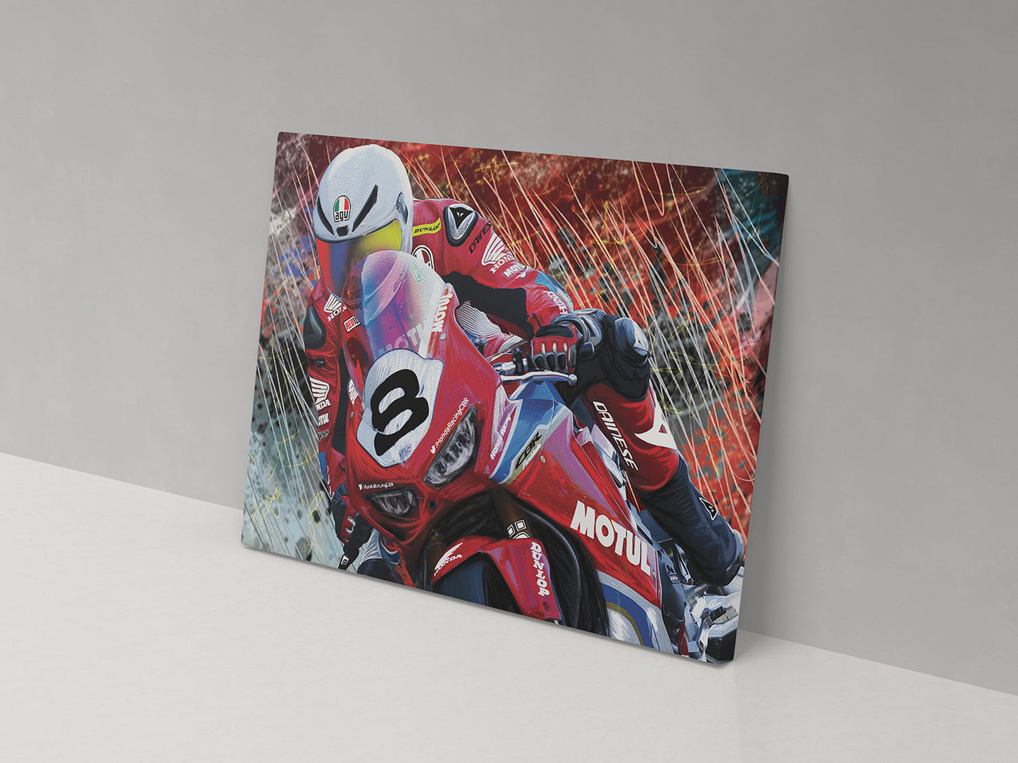 A canvas print featuring a colorful image of a motorcycle racer in action, predominantly red with the number 8 visible.
