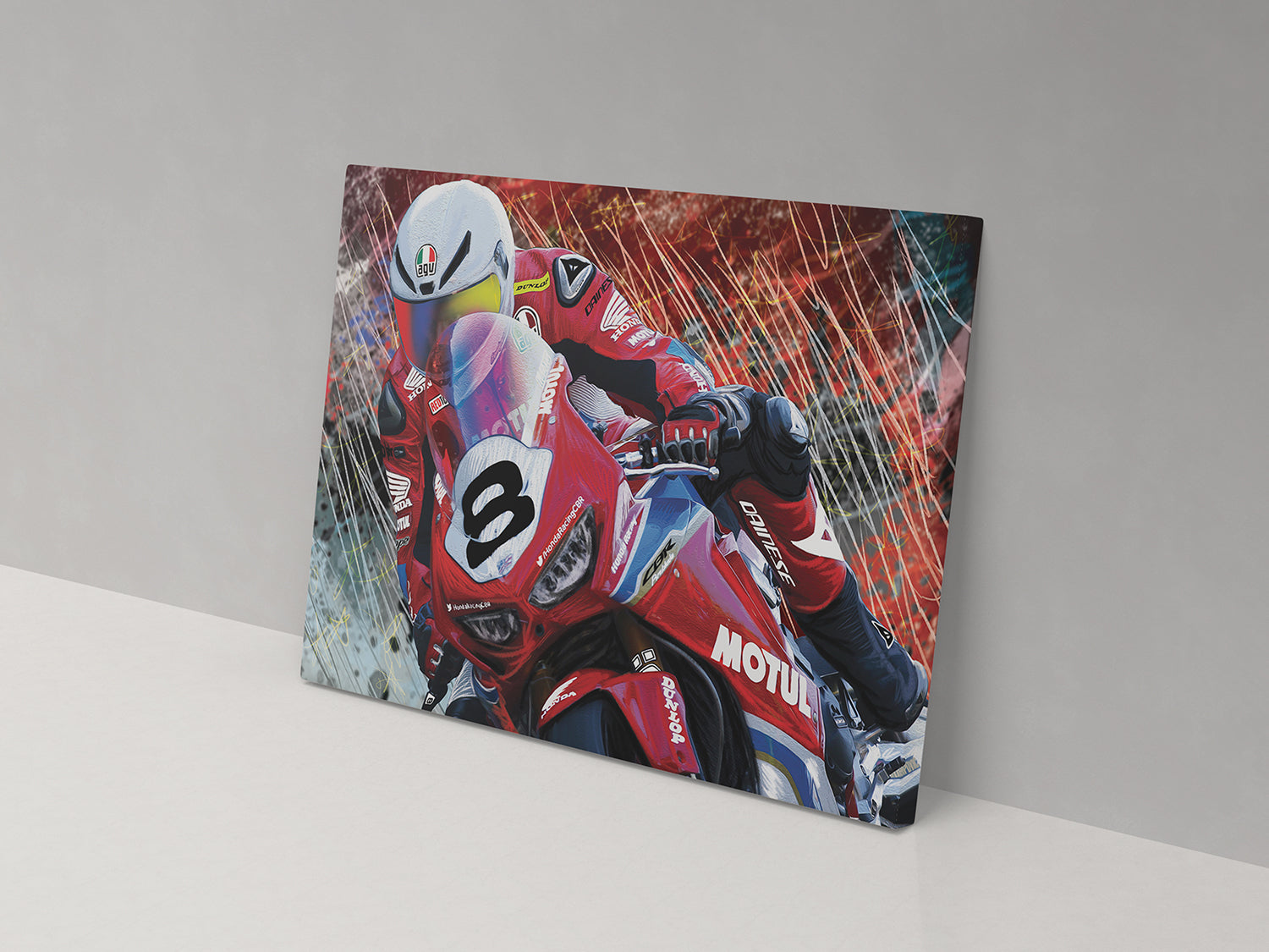 A canvas print featuring a colorful image of a motorcycle racer in action, predominantly red with the number 8 visible.