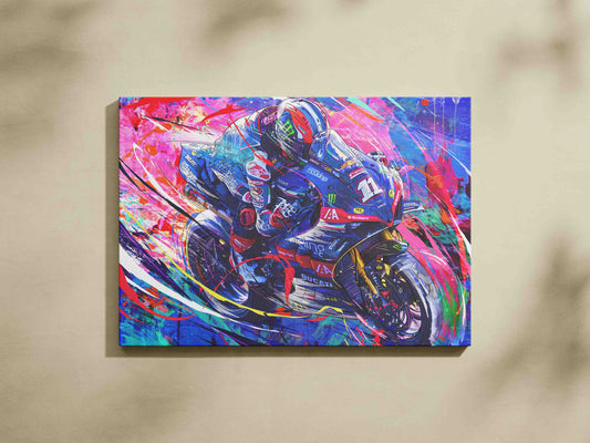 Rory Skinner riding the number 11 Ducati in vibrant blue and pink BSB artwork.